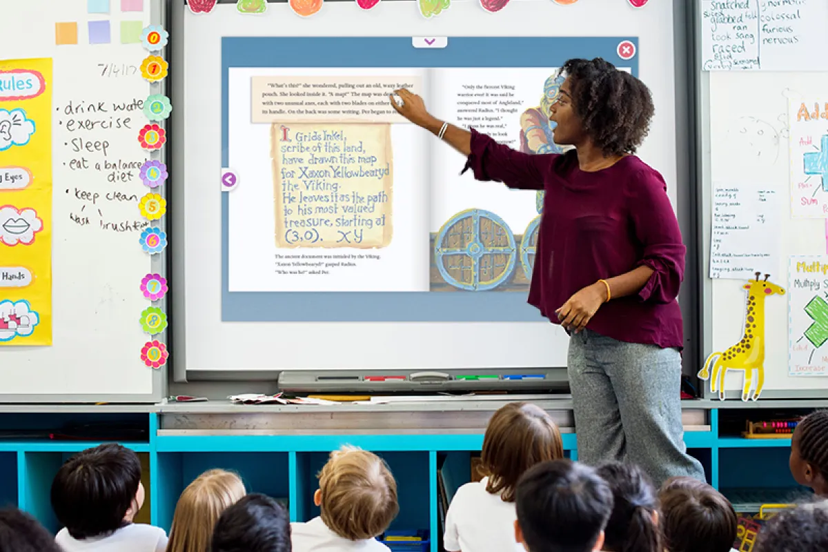 Image of teacher using Skybrary on a smart board